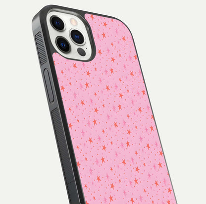 Cosmic Pink Sparkle iPhone 12 Pro glass phone case angled back view highlighting sparkling galaxy design and textured side grip