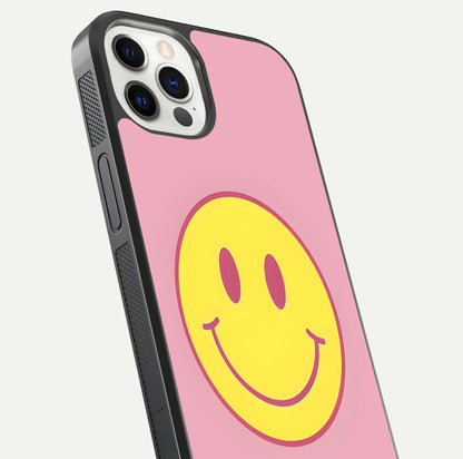 Happy Pink Mood iPhone 12 Pro glass phone case angled back view highlighting bright pink artwork and side grip texture