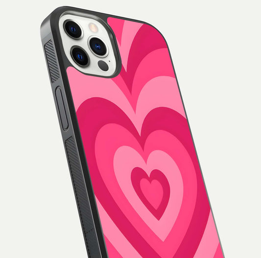 Layered Love Hearts iPhone 12 Pro glass phone case angled back view highlighting heart artwork and textured grip edges