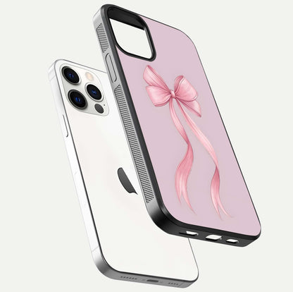 Soft Blush Bow iPhone 12 Pro glass phone case floating view emphasizing glossy surface and soft feminine styling
