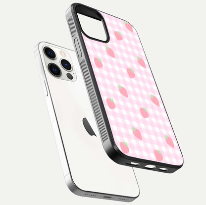 Strawberry Picnic Love iPhone 12 Pro glass phone case floating view emphasizing glossy finish and playful charm
