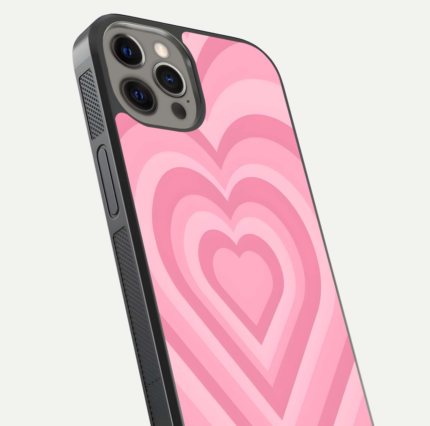 Blush Heart Waves iPhone 12 Pro Max glass phone case angled back view highlighting romantic heart wave artwork and grip texture