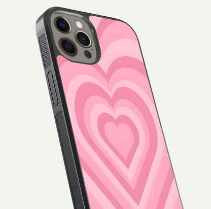 Blush Heart Waves iPhone 12 Pro Max glass phone case angled back view highlighting romantic heart wave artwork and grip texture