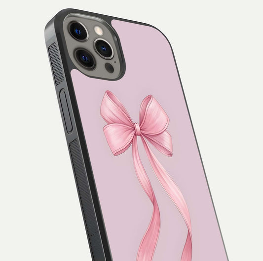 Soft Blush Bow iPhone 12 Pro Max glass phone case angled back view highlighting bow artwork and side grip texture