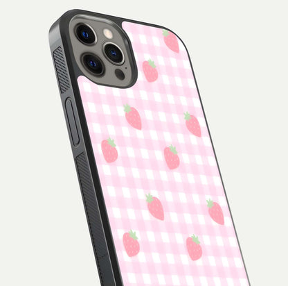 Strawberry Picnic Love iPhone 12 Pro Max glass phone case angled back view highlighting strawberry illustrations and textured grip