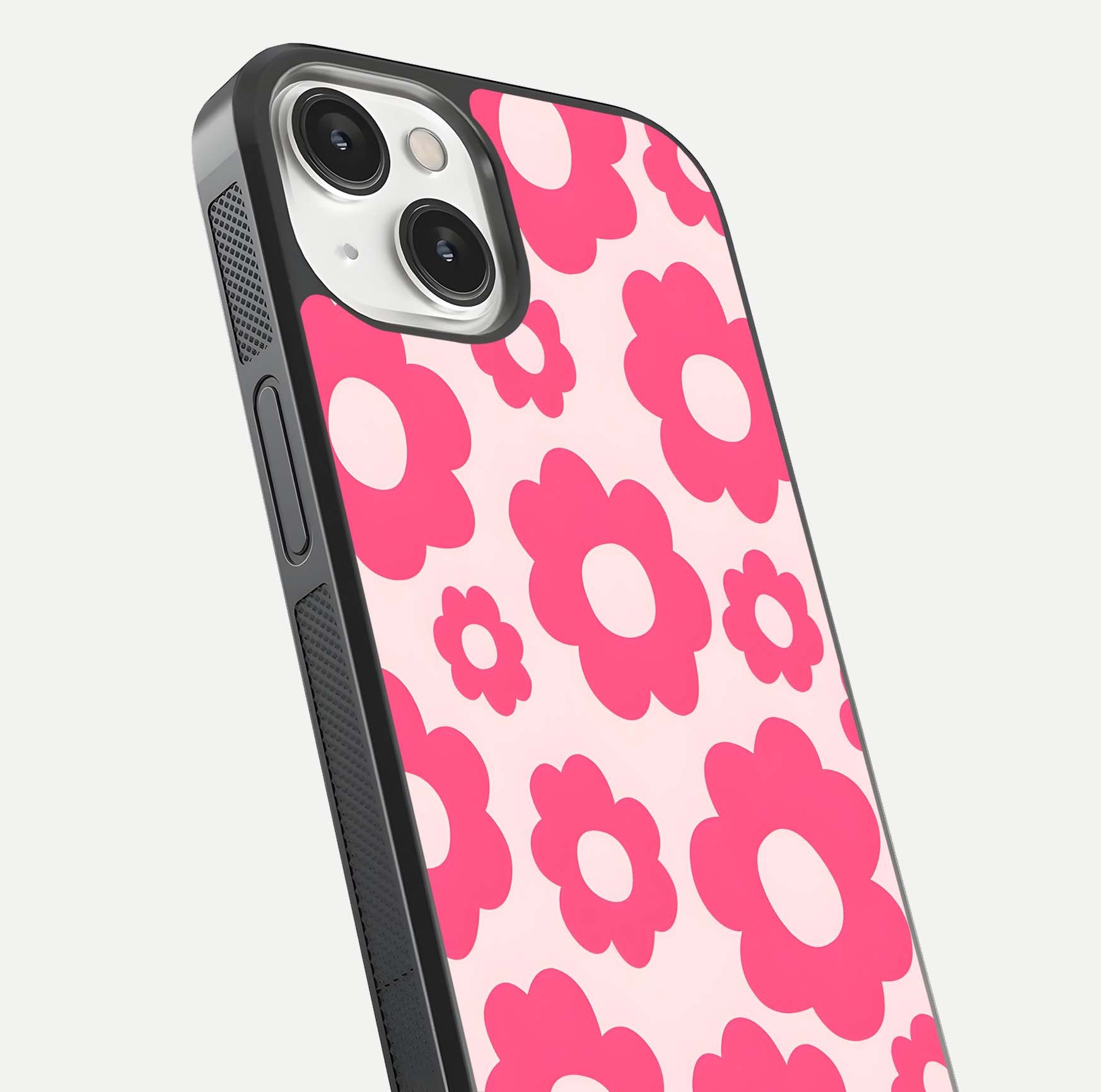 Blush Flower Pop iPhone 13 glass phone case angled back view highlighting bright floral pop design and side grip texture