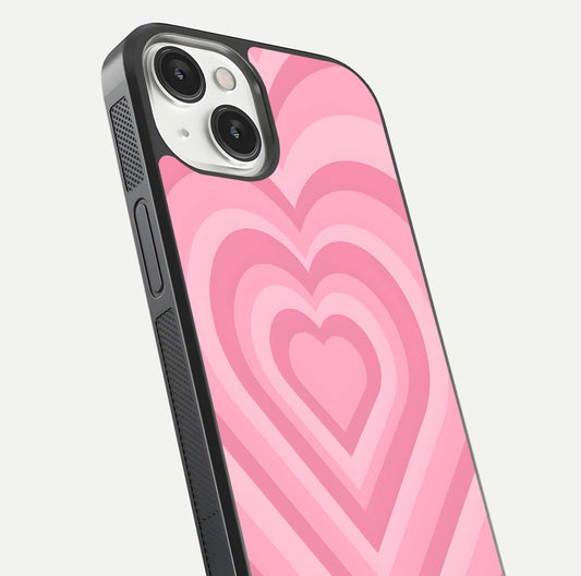Blush Heart Waves iPhone 13 glass phone case angled back view highlighting romantic heart wave artwork and grip texture