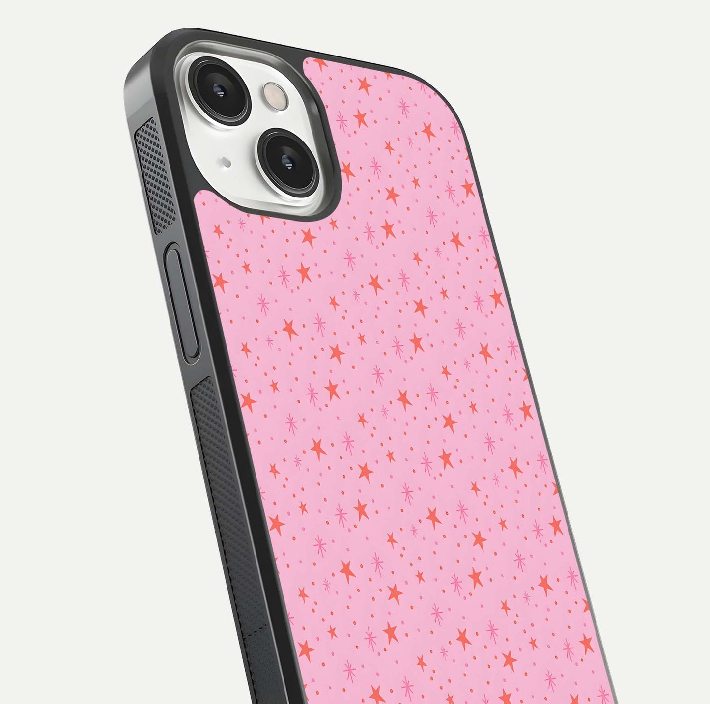 Cosmic Pink Sparkle iPhone 13 glass phone case angled back view highlighting sparkling galaxy design and textured side grip