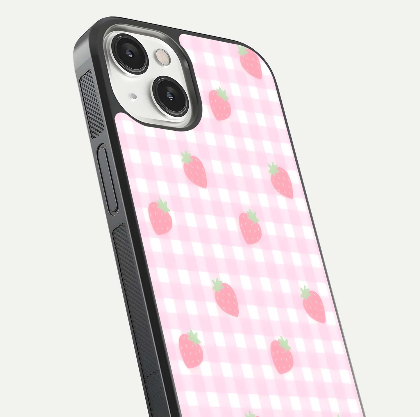 Strawberry Picnic Love iPhone 13 glass phone case angled back view highlighting strawberry illustrations and textured grip