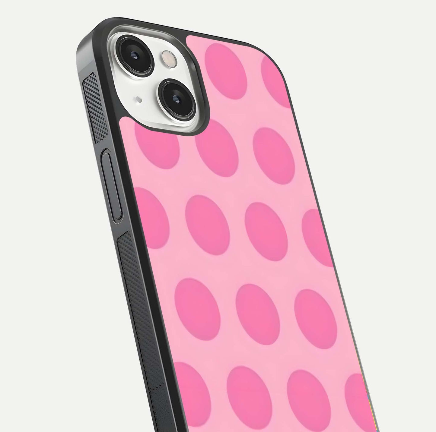 Sweet Dot Dreams iPhone 13 glass phone case angled back view highlighting dotted artwork and side grip texture