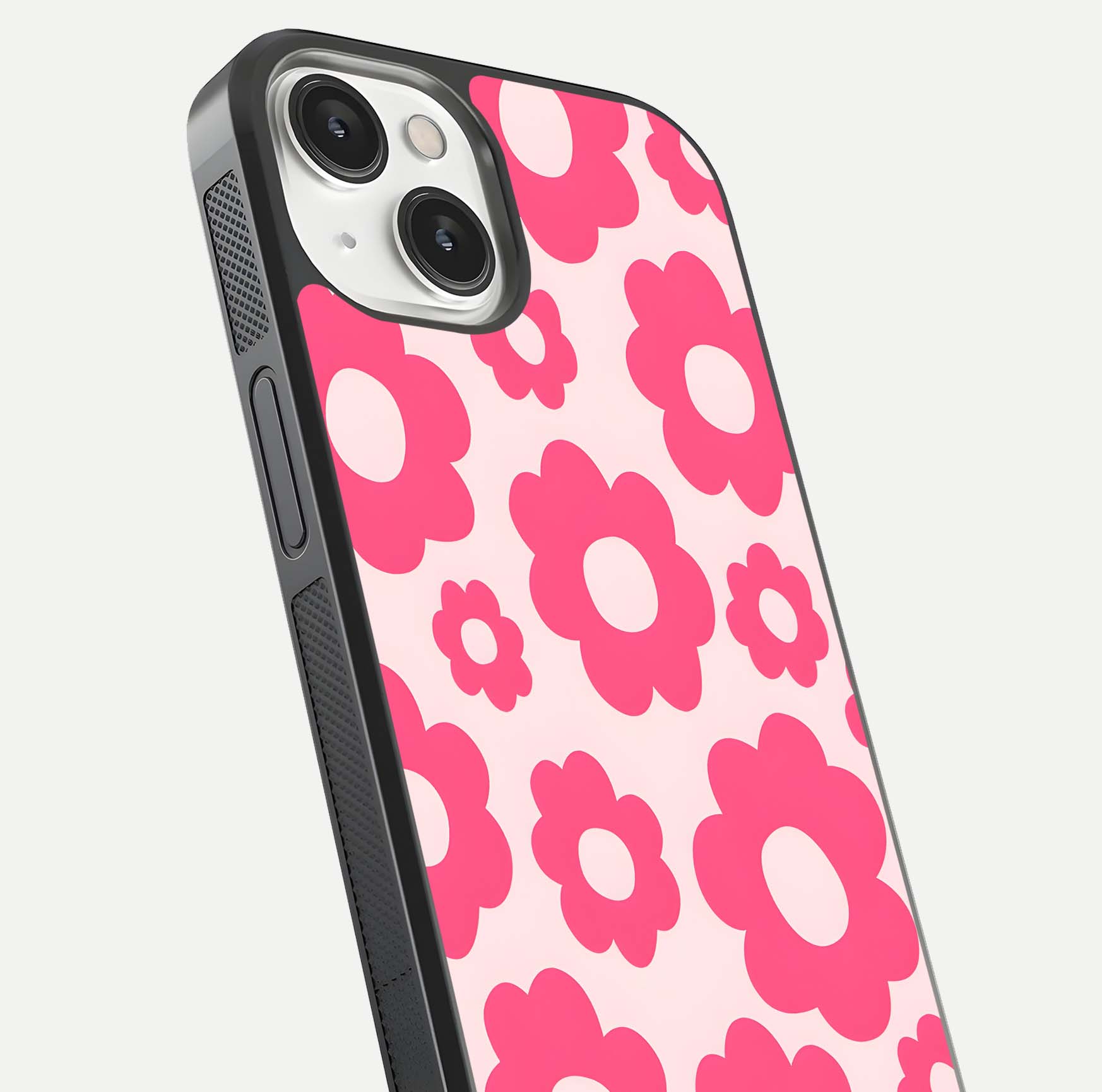 Blush Flower Pop iPhone 13 Mini glass phone case angled back view highlighting bright floral pop design and side grip texture