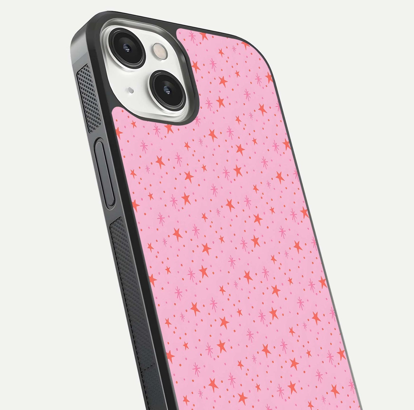 Cosmic Pink Sparkle iPhone 13 Mini glass phone case angled back view highlighting sparkling galaxy design and textured side grip