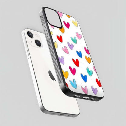 Playful Love Doodles iPhone 13 Mini glass phone case floating view emphasizing glossy finish and playful design