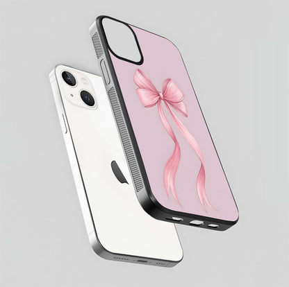 Soft Blush Bow iPhone 13 Mini glass phone case floating view emphasizing glossy surface and soft feminine styling