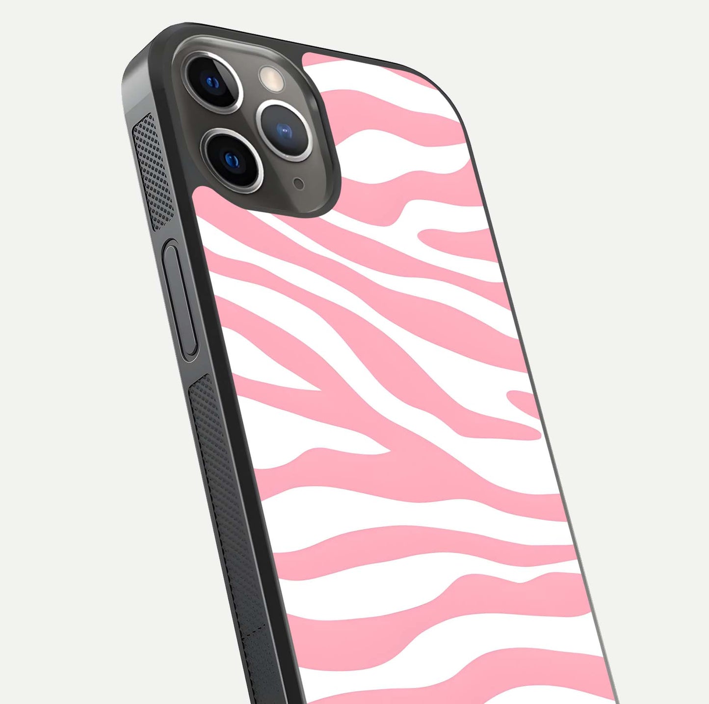 Blush Zebra Flow iPhone 13 Pro glass phone case angled back view highlighting bold zebra artwork and textured side grip