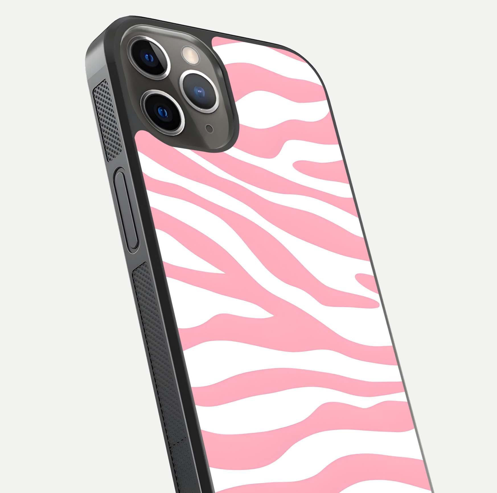 Blush Zebra Flow iPhone 13 Pro glass phone case angled back view highlighting bold zebra artwork and textured side grip