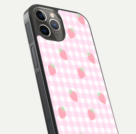 Strawberry Picnic Love iPhone 13 Pro glass phone case angled back view highlighting strawberry illustrations and textured grip