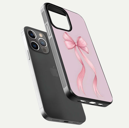 Soft Blush Bow iPhone 13 Pro glass phone case floating view emphasizing glossy surface and soft feminine styling
