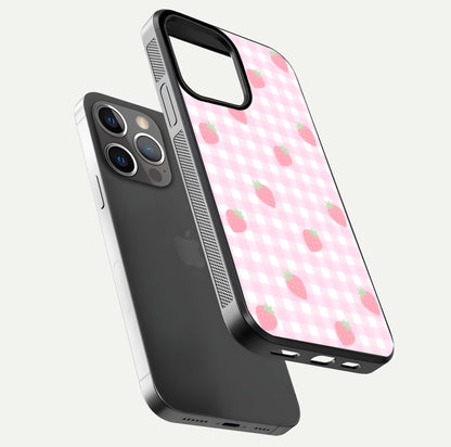 Strawberry Picnic Love iPhone 13 Pro glass phone case floating view emphasizing glossy finish and playful charm