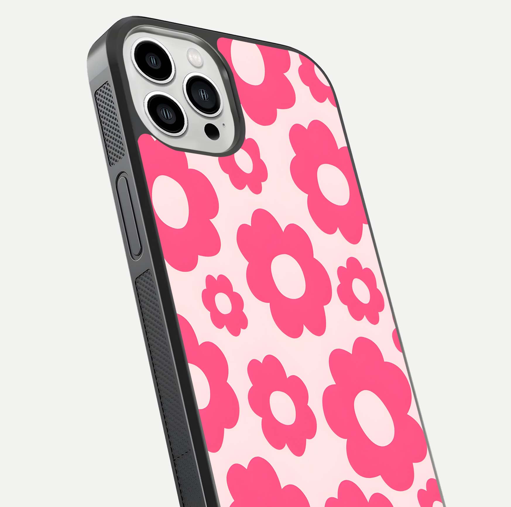 Blush Flower Pop iPhone 13 Pro Max glass phone case angled back view highlighting bright floral pop design and side grip texture