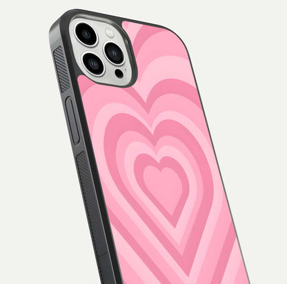 Blush Heart Waves iPhone 13 Pro Max glass phone case angled back view highlighting romantic heart wave artwork and grip texture