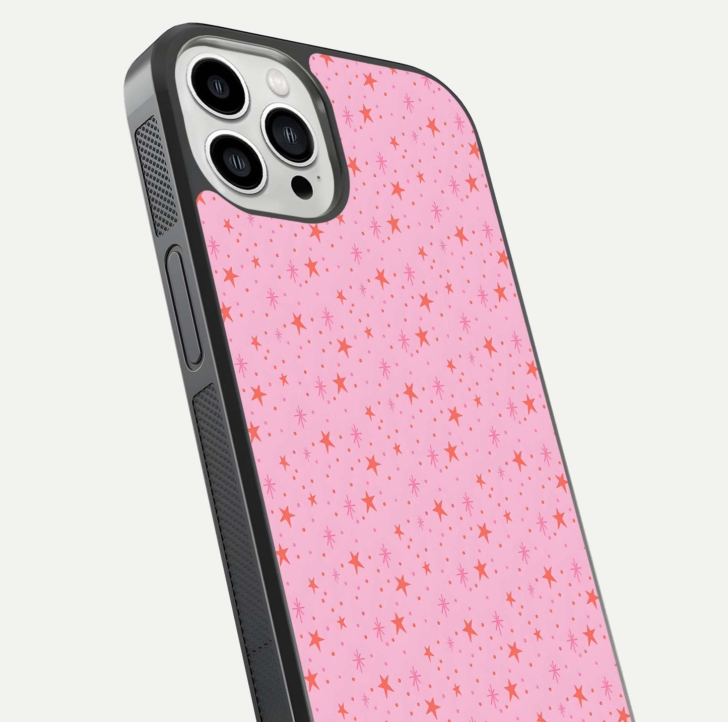 Cosmic Pink Sparkle iPhone 13 Pro Max glass phone case angled back view highlighting sparkling galaxy design and textured side grip