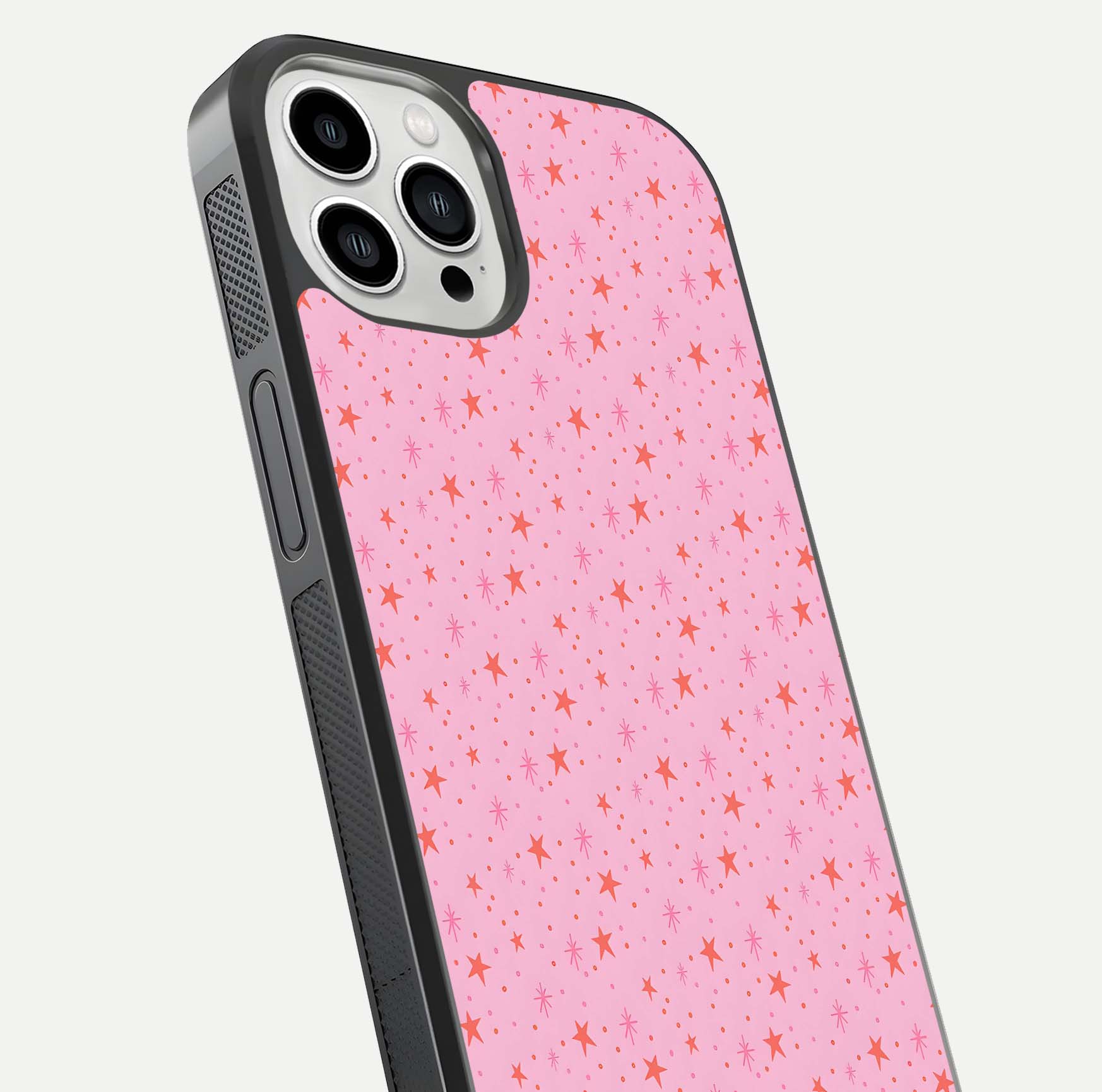 Cosmic Pink Sparkle iPhone 13 Pro Max glass phone case angled back view highlighting sparkling galaxy design and textured side grip