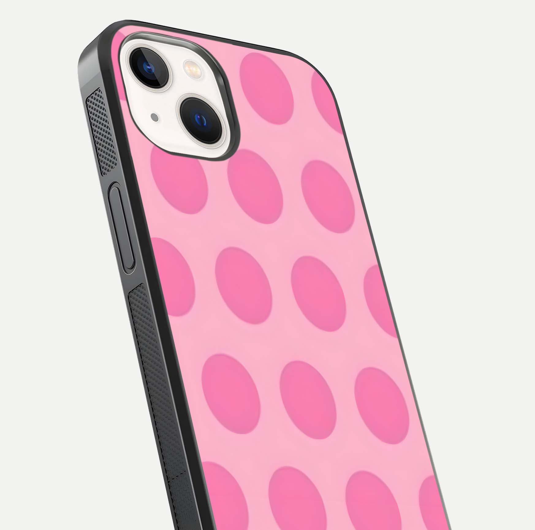 Sweet Dot Dreams iPhone 14 glass phone case angled back view highlighting dotted artwork and side grip texture