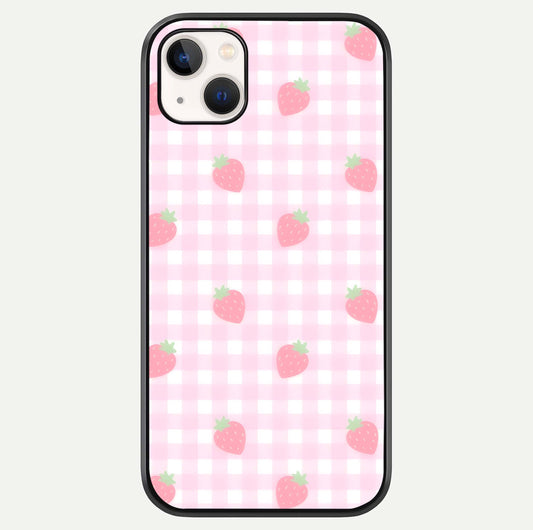 Strawberry Picnic Love iPhone 14 Plus glass phone case front view featuring cute strawberry picnic artwork with romantic vibe