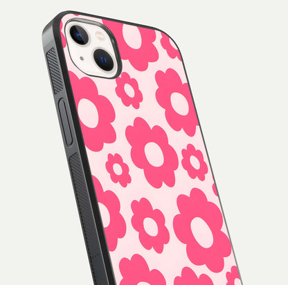 Blush Flower Pop iPhone 14 Plus glass phone case angled back view highlighting bright floral pop design and side grip texture