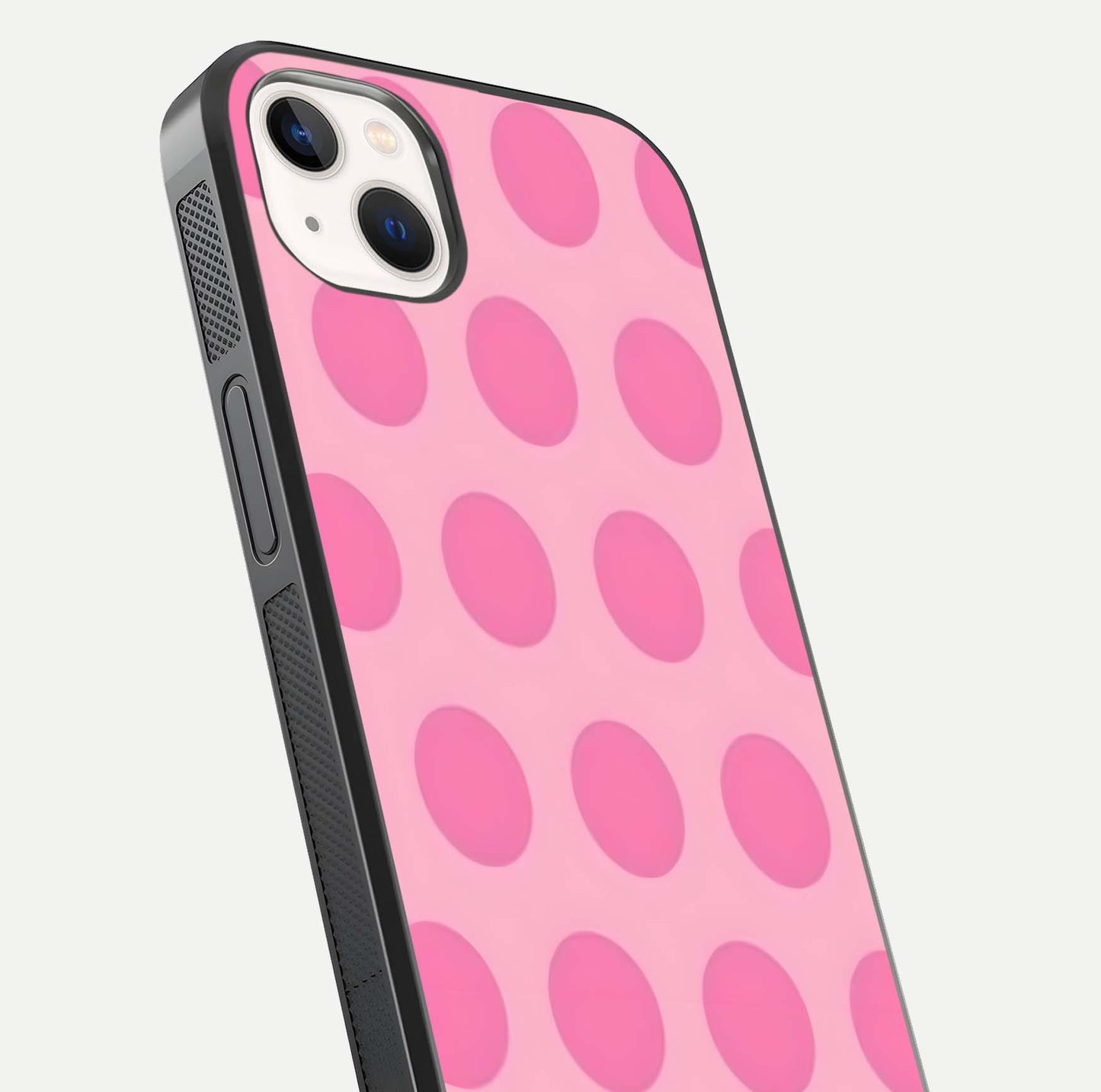 Sweet Dot Dreams iPhone 14 Plus glass phone case angled back view highlighting dotted artwork and side grip texture