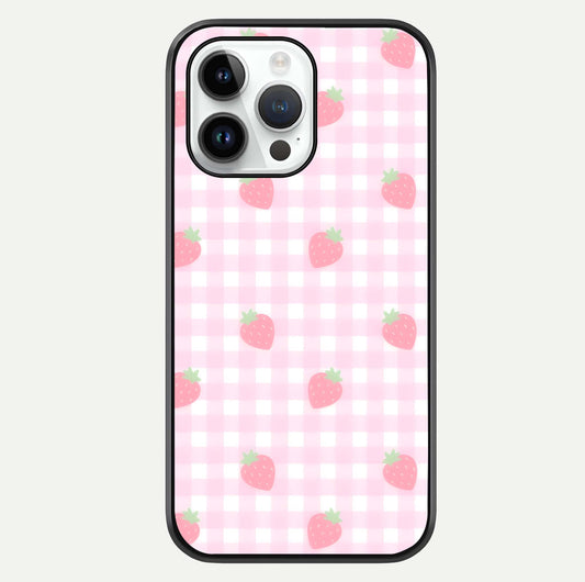Strawberry Picnic Love iPhone 14 Pro glass phone case front view featuring cute strawberry picnic artwork with romantic vibe