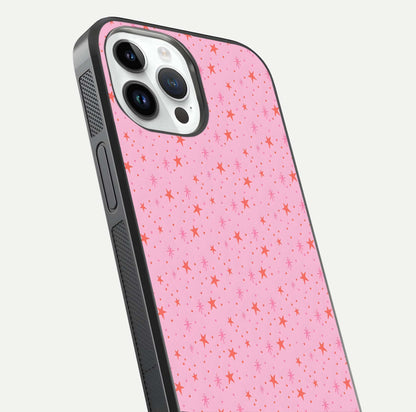Cosmic Pink Sparkle iPhone 14 Pro glass phone case angled back view highlighting sparkling galaxy design and textured side grip