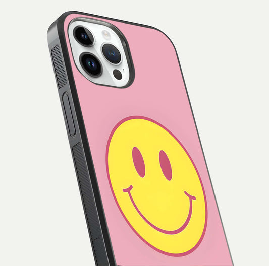 Happy Pink Mood iPhone 14 Pro glass phone case angled back view highlighting bright pink artwork and side grip texture