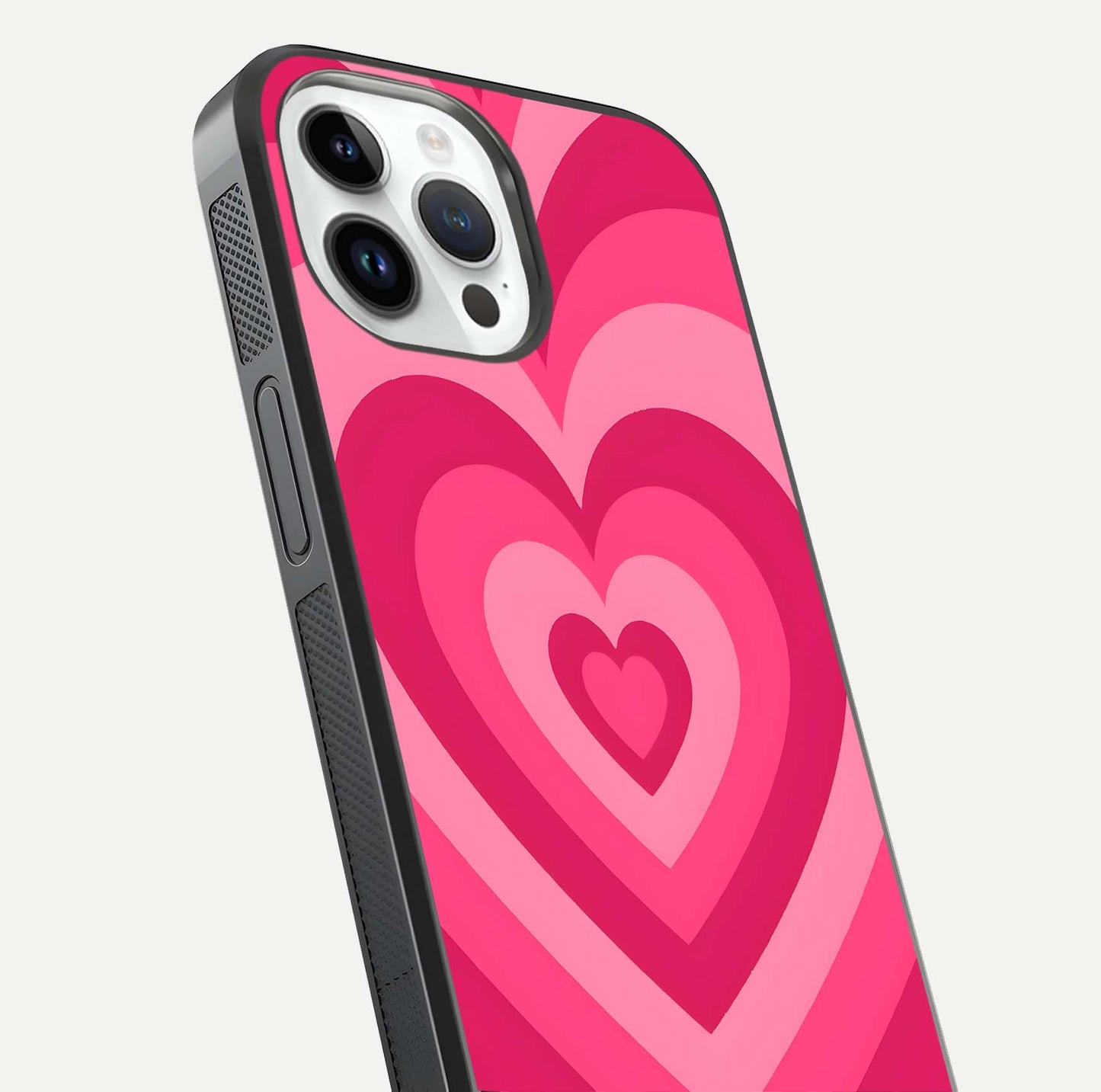 Layered Love Hearts iPhone 14 Pro glass phone case angled back view highlighting heart artwork and textured grip edges
