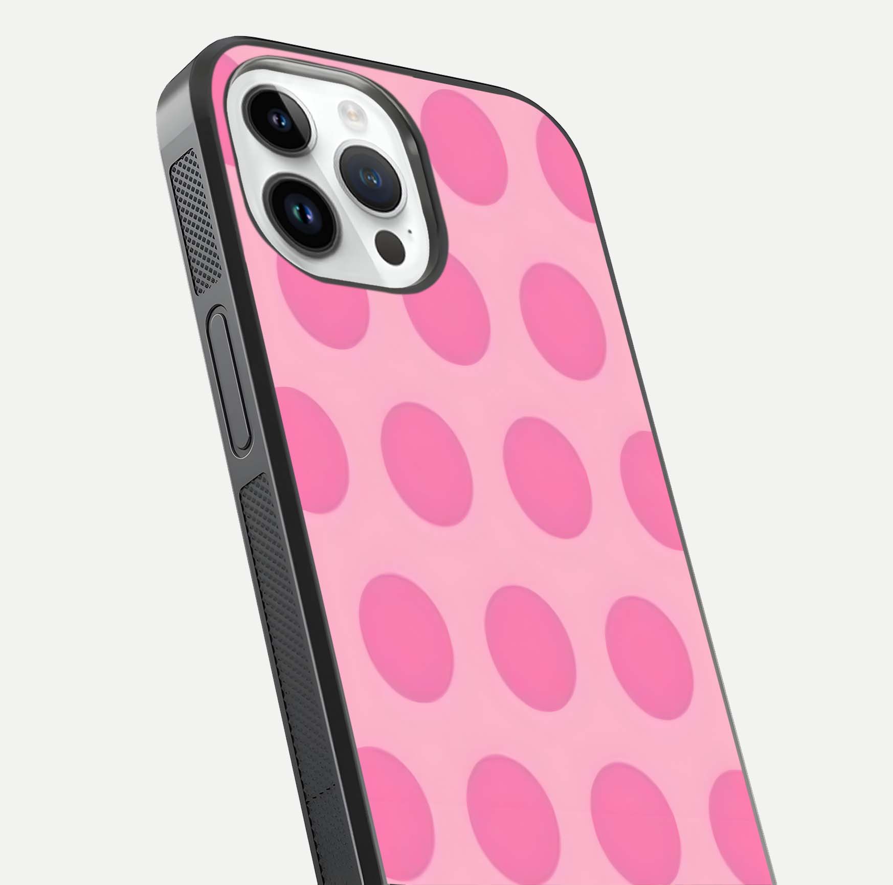 Sweet Dot Dreams iPhone 14 Pro glass phone case angled back view highlighting dotted artwork and side grip texture