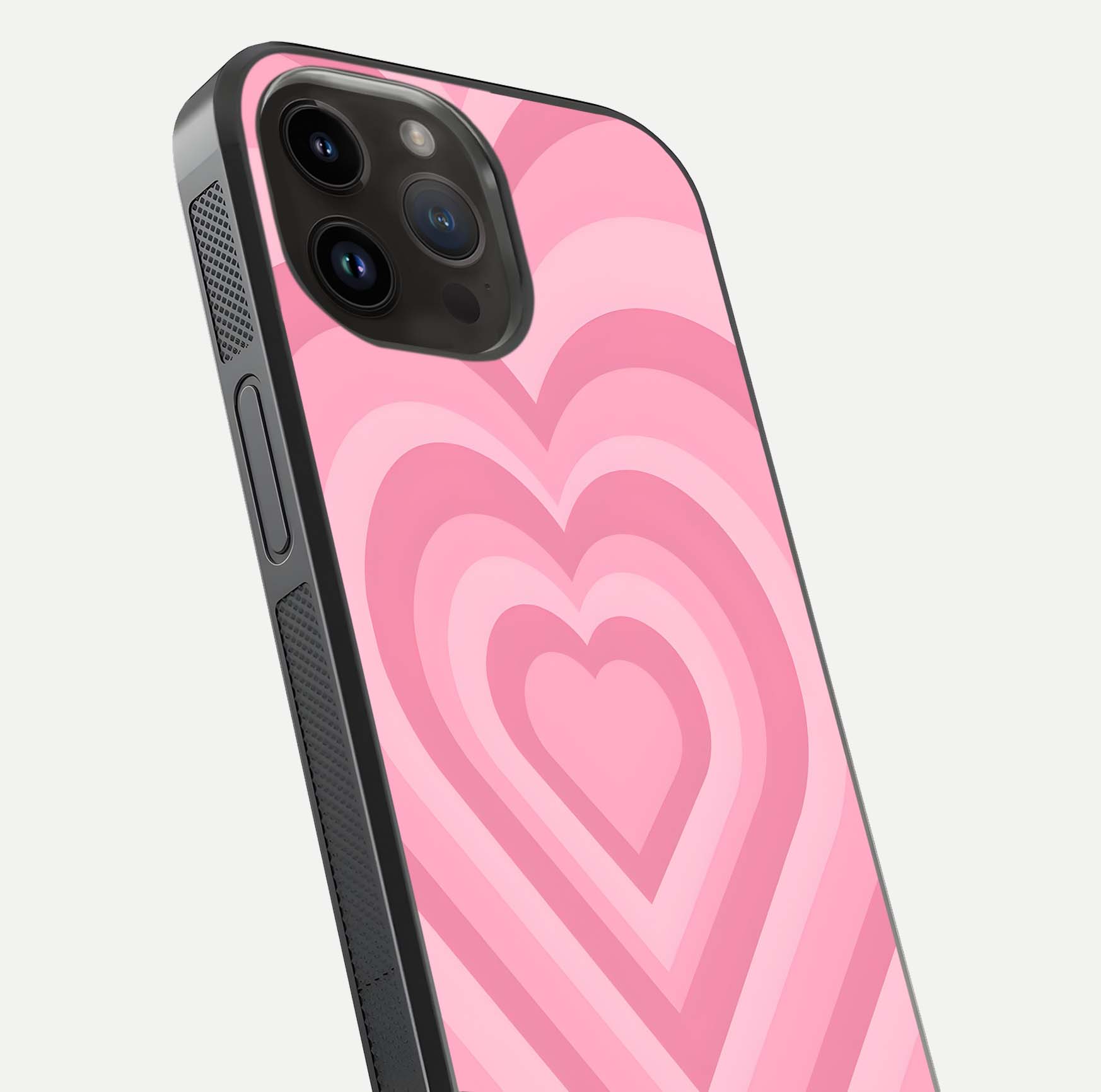 Blush Heart Waves iPhone 14 Pro Max glass phone case angled back view highlighting romantic heart wave artwork and grip texture