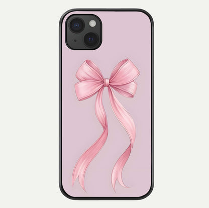 Soft Blush Bow iPhone 15 Plus glass phone case front view showcasing soft blush tones with elegant bow design
