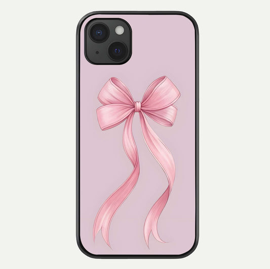 Soft Blush Bow iPhone 15 Plus glass phone case front view showcasing soft blush tones with elegant bow design