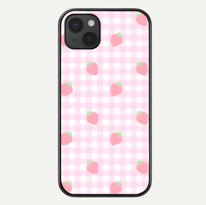 Strawberry Picnic Love iPhone 15 Plus glass phone case front view featuring cute strawberry picnic artwork with romantic vibe