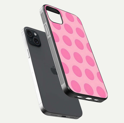Sweet Dot Dreams iPhone 15 Plus glass phone case floating view emphasizing glossy surface and soft playful styling