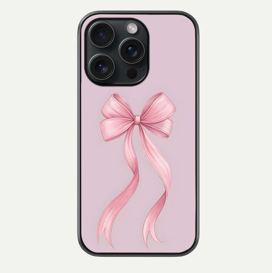 Soft Blush Bow iPhone 15 Pro glass phone case front view showcasing soft blush tones with elegant bow design