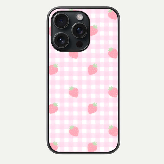 Strawberry Picnic Love iPhone 15 Pro glass phone case front view featuring cute strawberry picnic artwork with romantic vibe