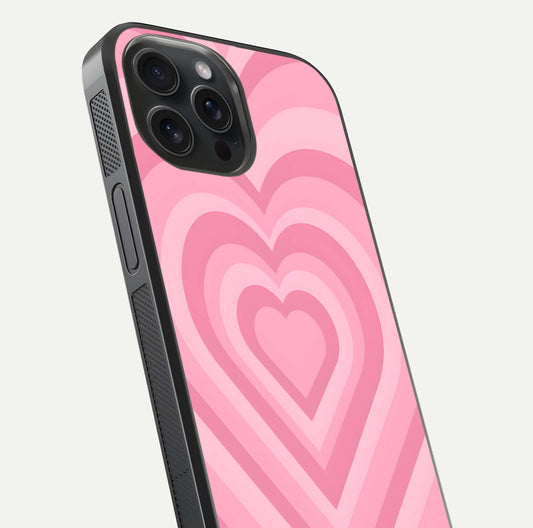 Blush Heart Waves iPhone 15 Pro glass phone case angled back view highlighting romantic heart wave artwork and grip texture