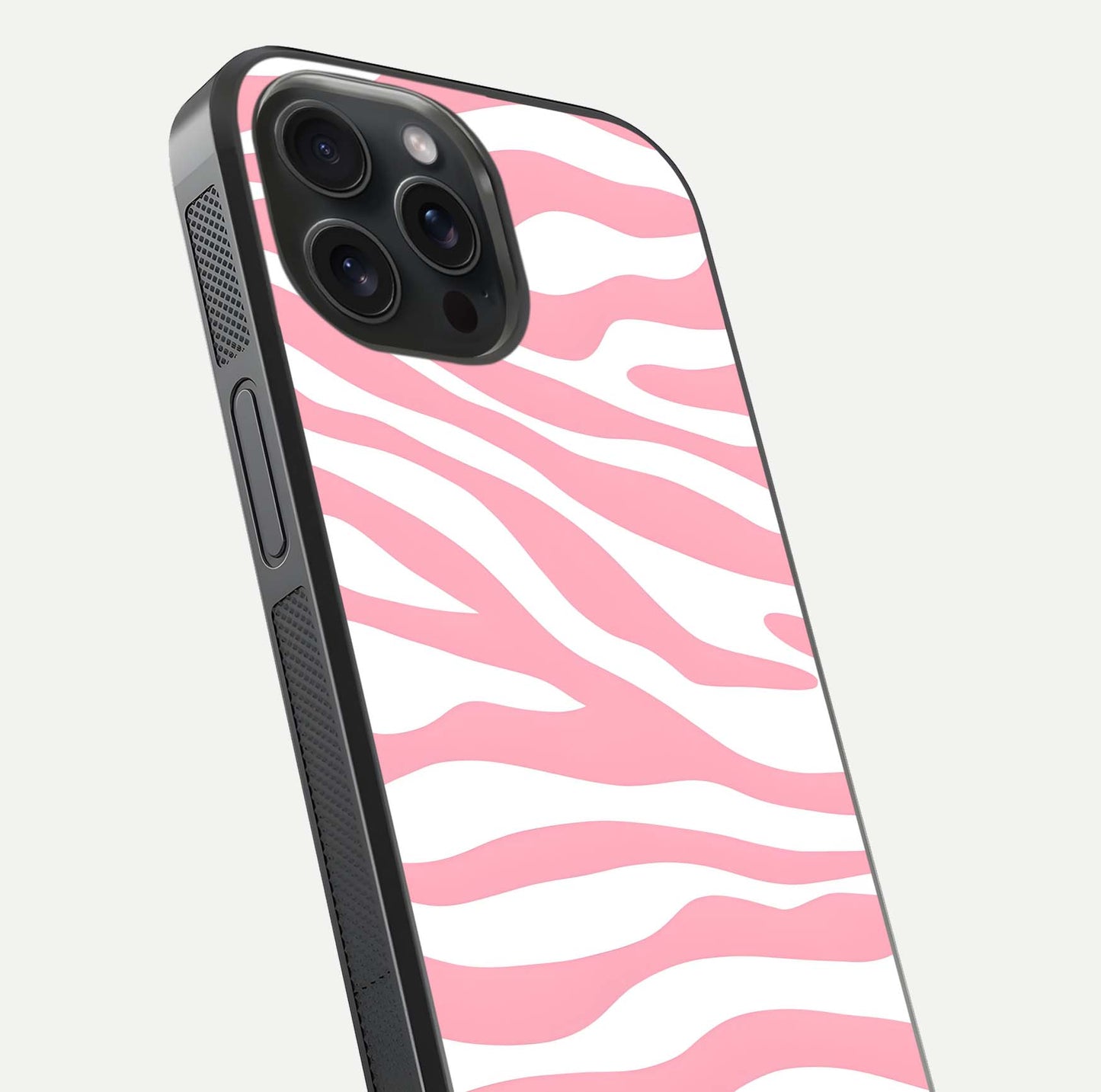 Blush Zebra Flow iPhone 15 Pro glass phone case angled back view highlighting bold zebra artwork and textured side grip