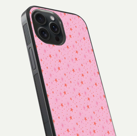 Cosmic Pink Sparkle iPhone 15 Pro glass phone case angled back view highlighting sparkling galaxy design and textured side grip