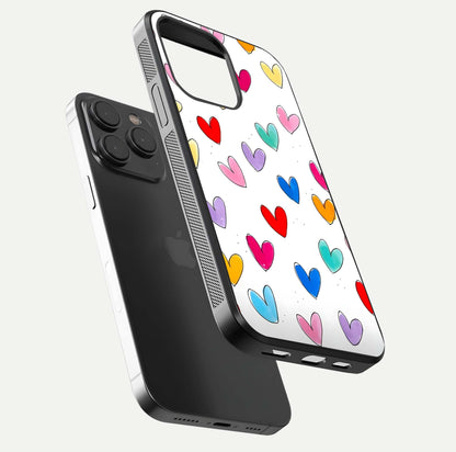 Playful Love Doodles iPhone 15 Pro glass phone case floating view emphasizing glossy finish and playful design