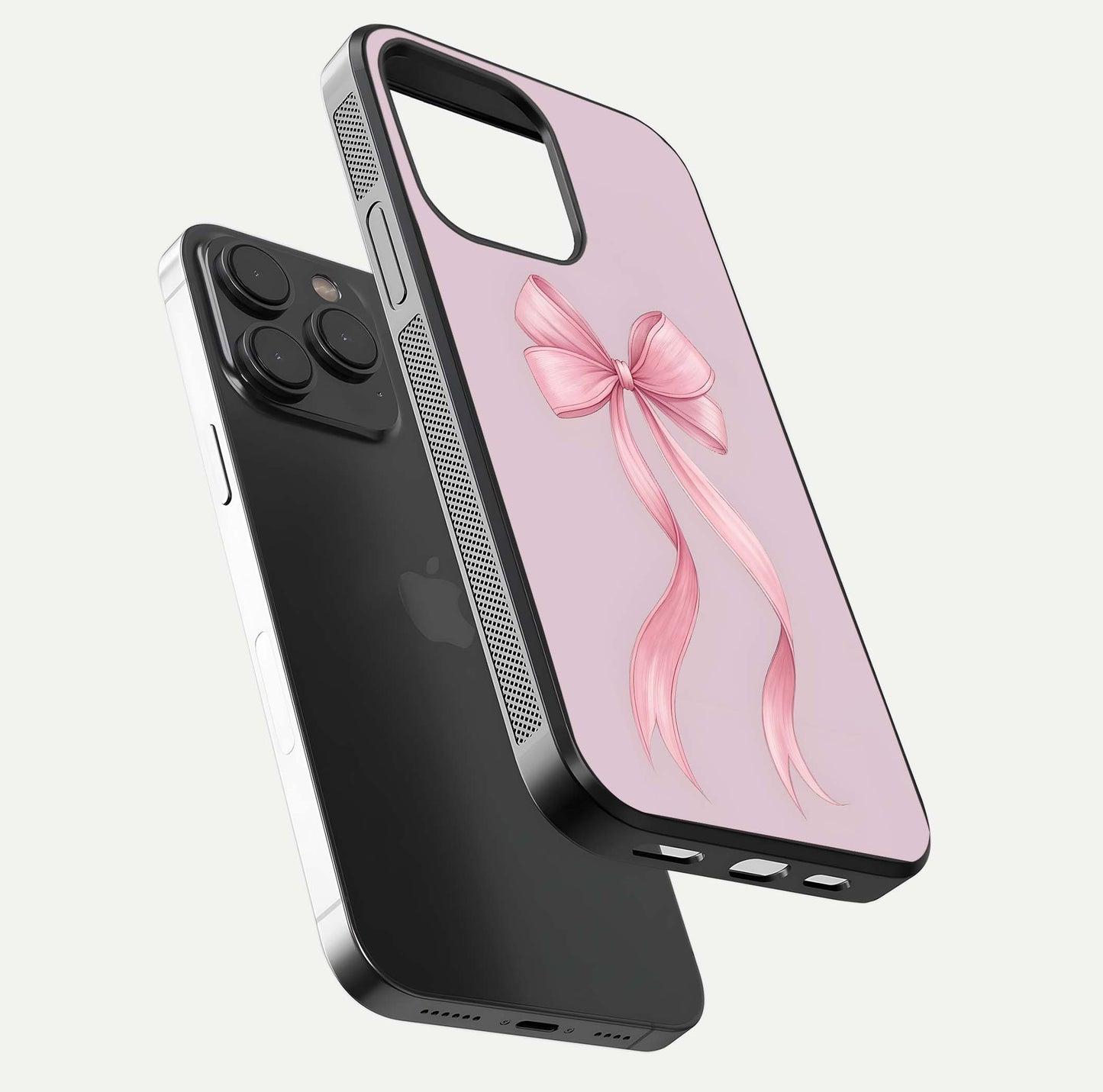 Soft Blush Bow iPhone 15 Pro glass phone case floating view emphasizing glossy surface and soft feminine styling