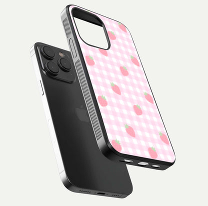 Strawberry Picnic Love iPhone 15 Pro glass phone case floating view emphasizing glossy finish and playful charm