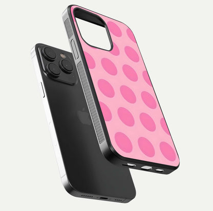 Sweet Dot Dreams iPhone 15 Pro glass phone case floating view emphasizing glossy surface and soft playful styling